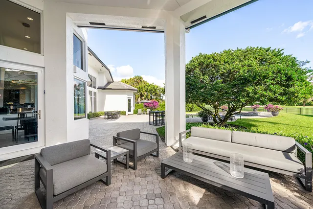 a building outdoor space with patio furniture