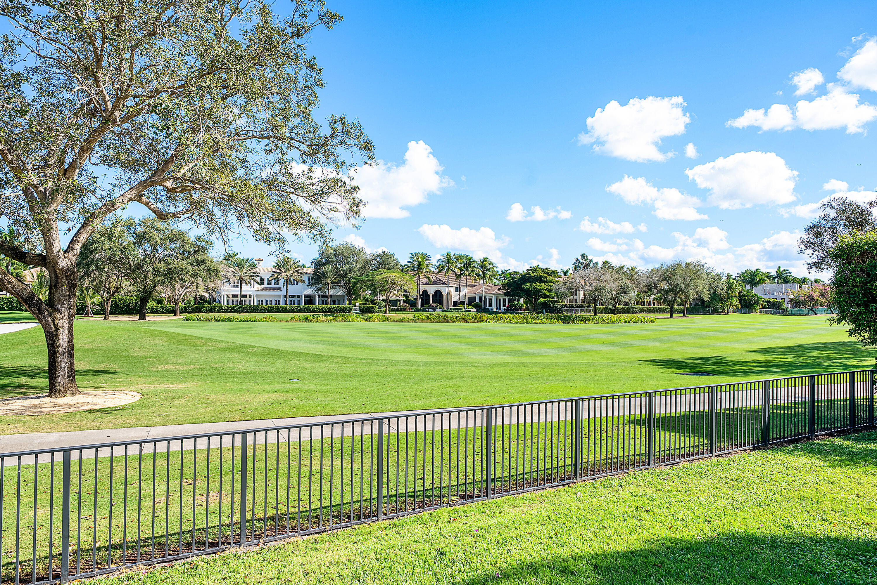 3710 Northwest 53rd Street Boca Raton, FL 33496 - Photo 40 of 42 a view of a golf course with a lake view