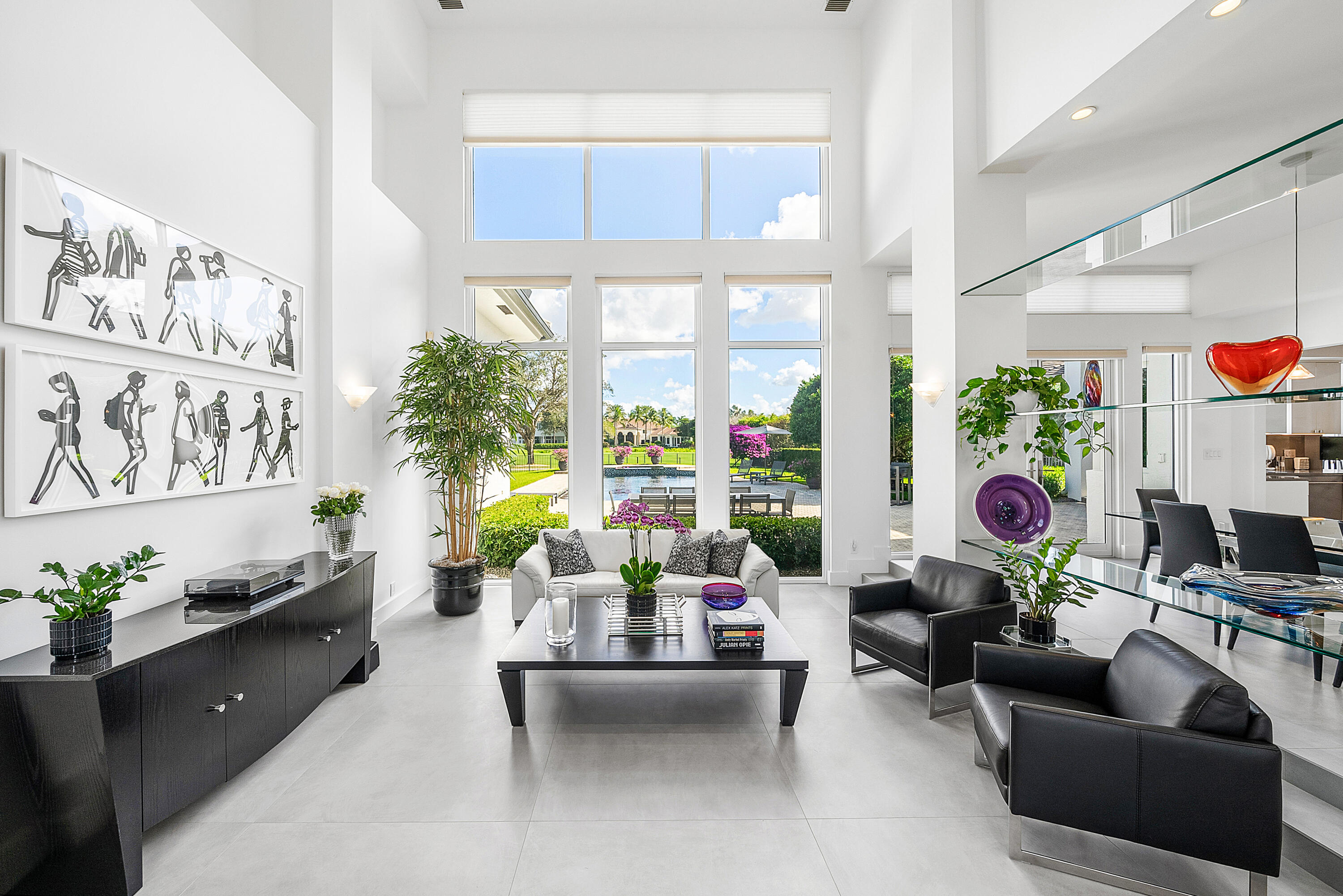 3710 Northwest 53rd Street Boca Raton, FL 33496 - Photo 4 of 42 a living room with furniture and a potted plant