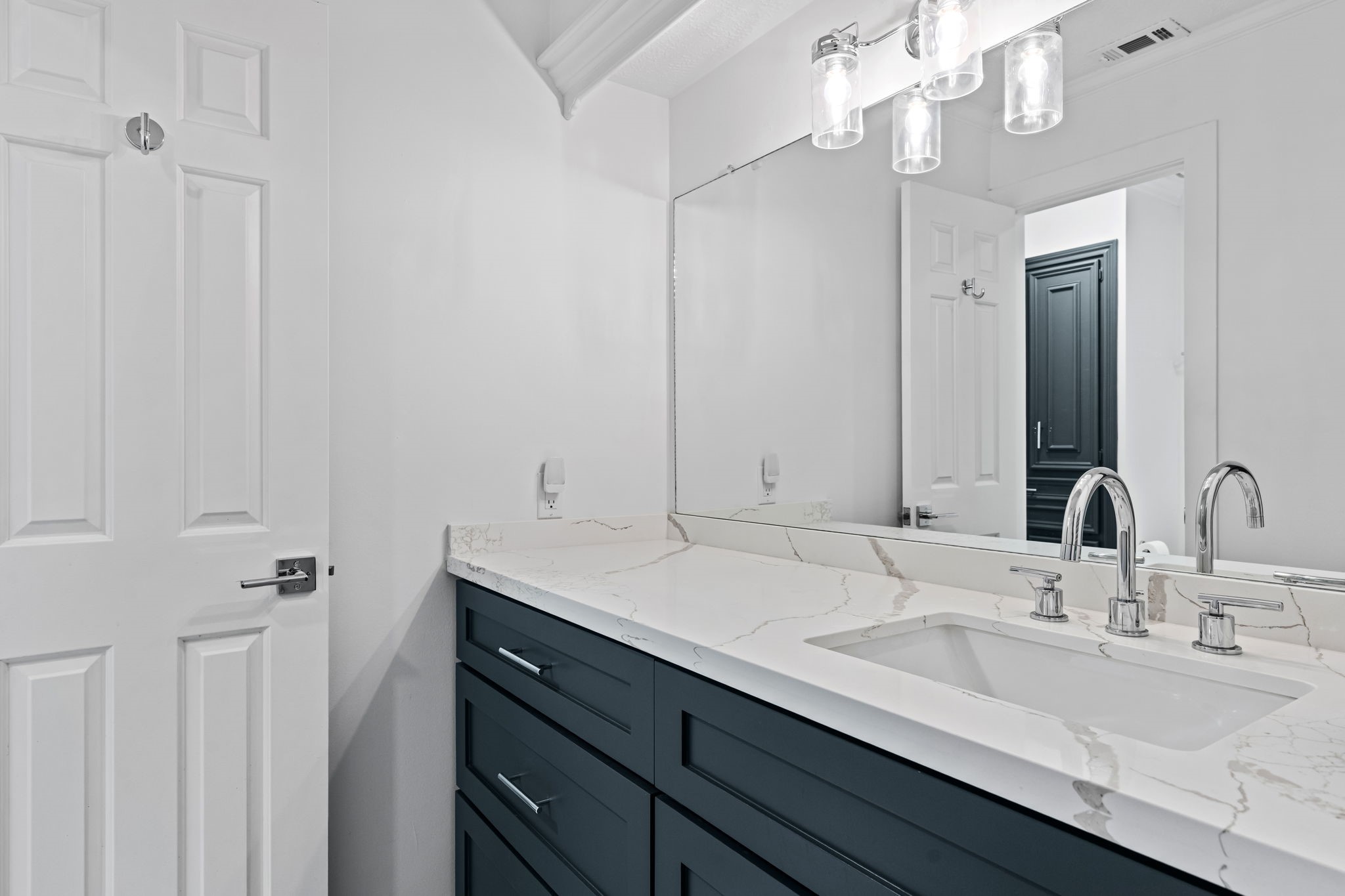 9410 Windrush Drive Spring, TX 77379 - Photo 35 of 50 a bathroom with a sink double vanity and a mirror