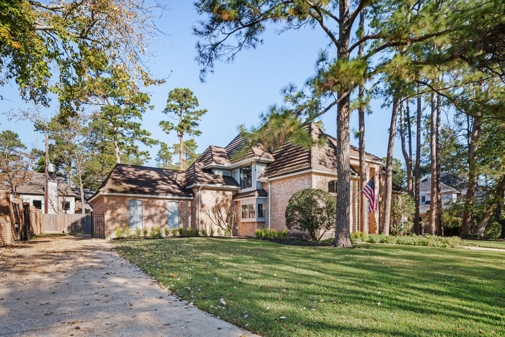 9410 Windrush Drive Spring, TX 77379 - Photo 50 of 50 a front view of a house with a garden