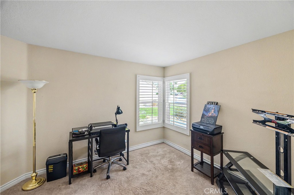 43121 Corte Cabrera Temecula, CA 92592 - Photo 8 of 17 a view of a workspace with furniture and a window
