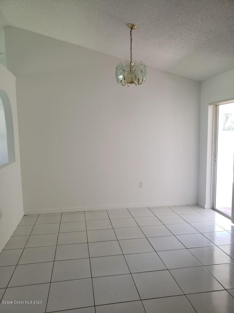 1280 Seabold Road Southwest Palm Bay, FL 32908 - Photo 13 of 28 a view of empty room with windows