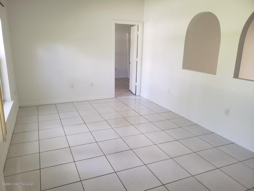 1280 Seabold Road Southwest Palm Bay, FL 32908 - Photo 14 of 28 a view of a livingroom and entryway