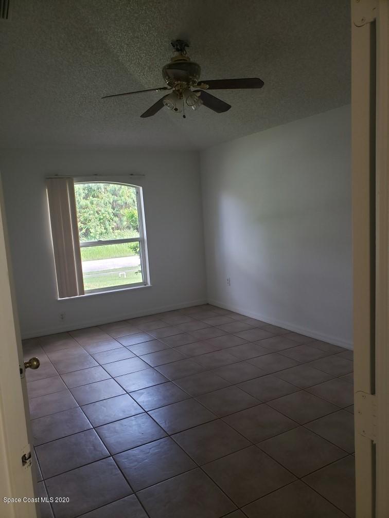 1280 Seabold Road Southwest Palm Bay, FL 32908 - Photo 16 of 28 an empty room with a window