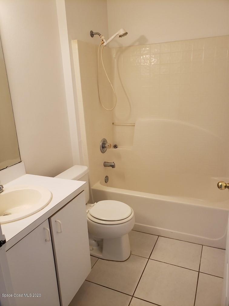 1280 Seabold Road Southwest Palm Bay, FL 32908 - Photo 21 of 28 a bathroom with a toilet and a shower