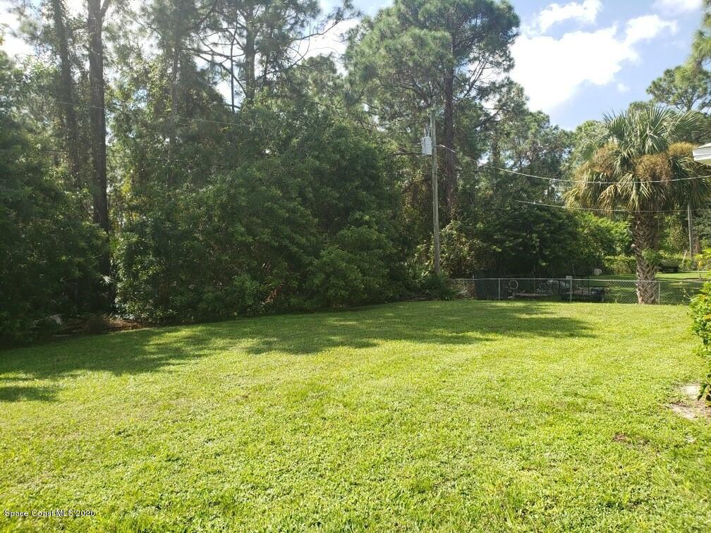 1280 Seabold Road Southwest Palm Bay, FL 32908 - Photo 6 of 28 a view of a yard