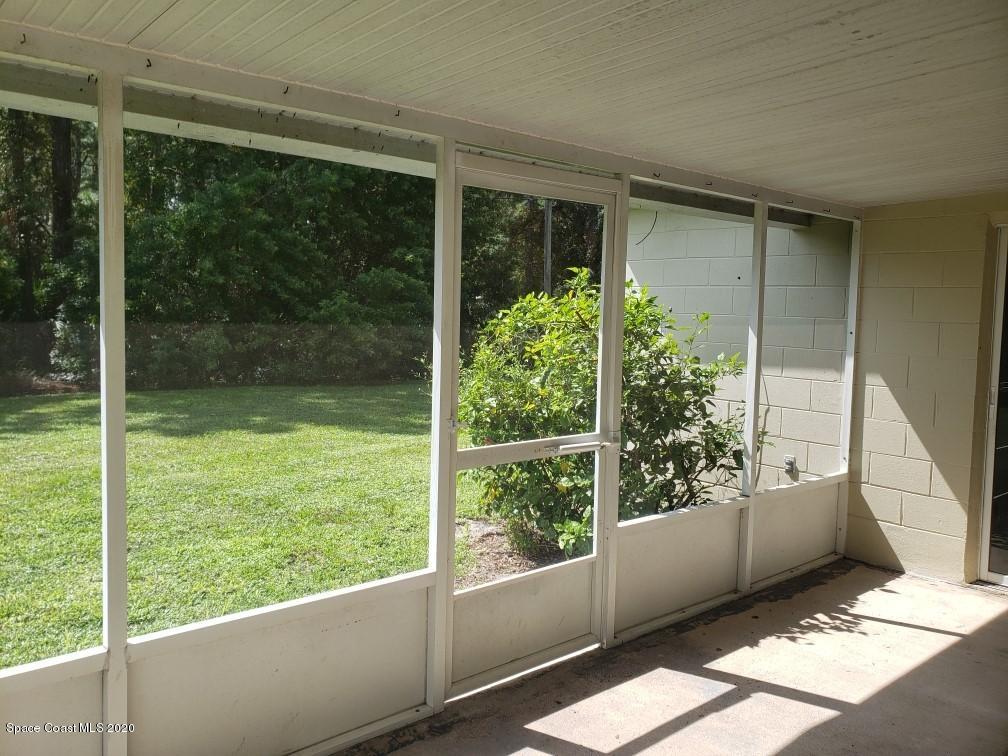 1280 Seabold Road Southwest Palm Bay, FL 32908 - Photo 7 of 28 a view of a back yard from a window