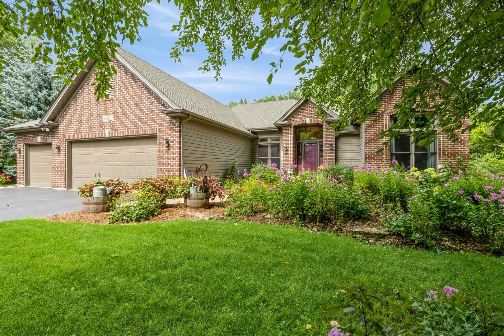 8N681 Edgewood Road Elgin, IL 60124 - Photo 1 of 31 a front view of house with yard and green space