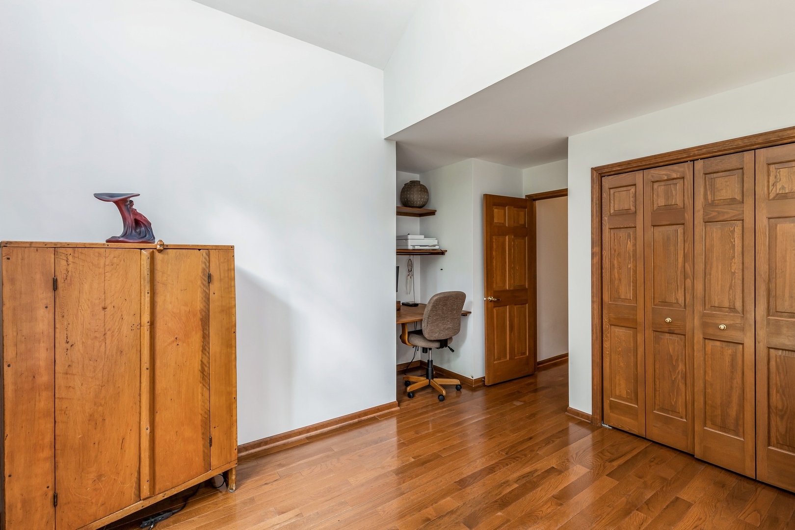 8N681 Edgewood Road Elgin, IL 60124 - Photo 23 of 31 a view of a room with wooden floor closet and bathroom