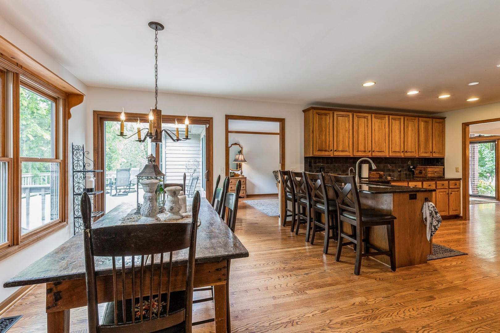8N681 Edgewood Road Elgin, IL 60124 - Photo 7 of 31 a view of a dining room with furniture window and wooden floor
