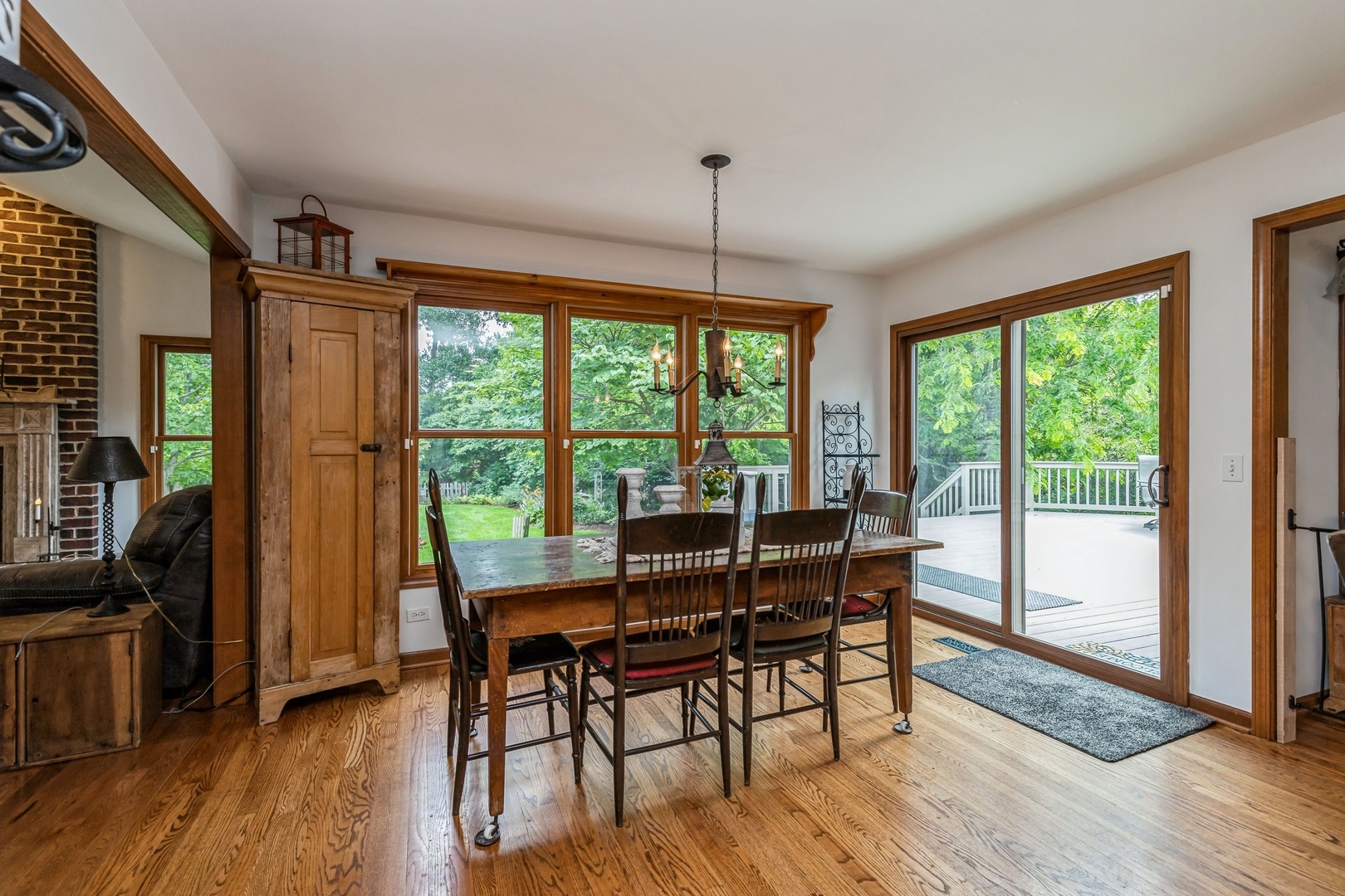 8N681 Edgewood Road Elgin, IL 60124 - Photo 8 of 31 a view of a dining room with furniture window and wooden floor
