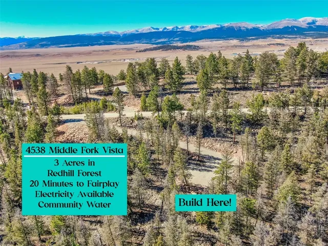 a view of a street with an ocean view
