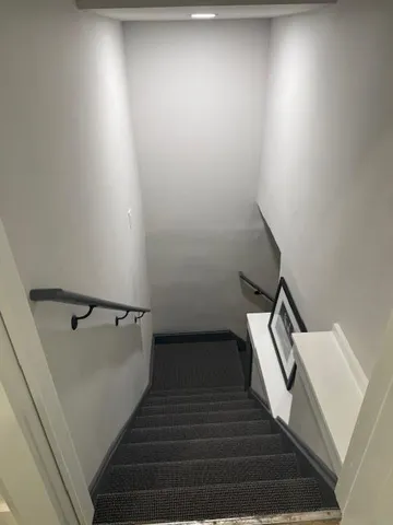 a view of entryway with wooden floor