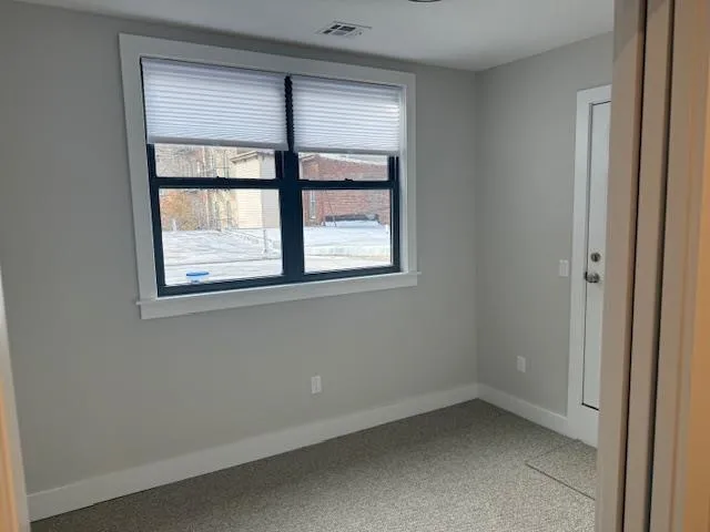 an empty room with a window