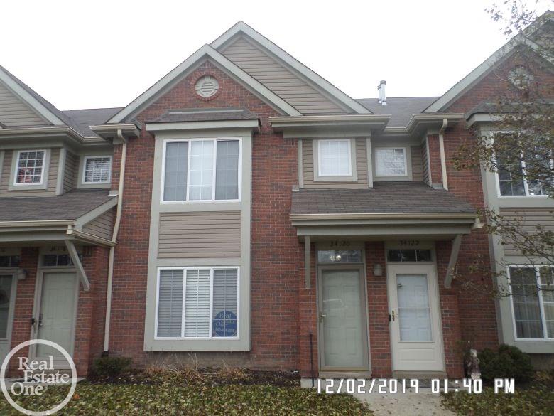 34120 Utica Road Fraser, MI 48026 - Photo 1 of 17 Front