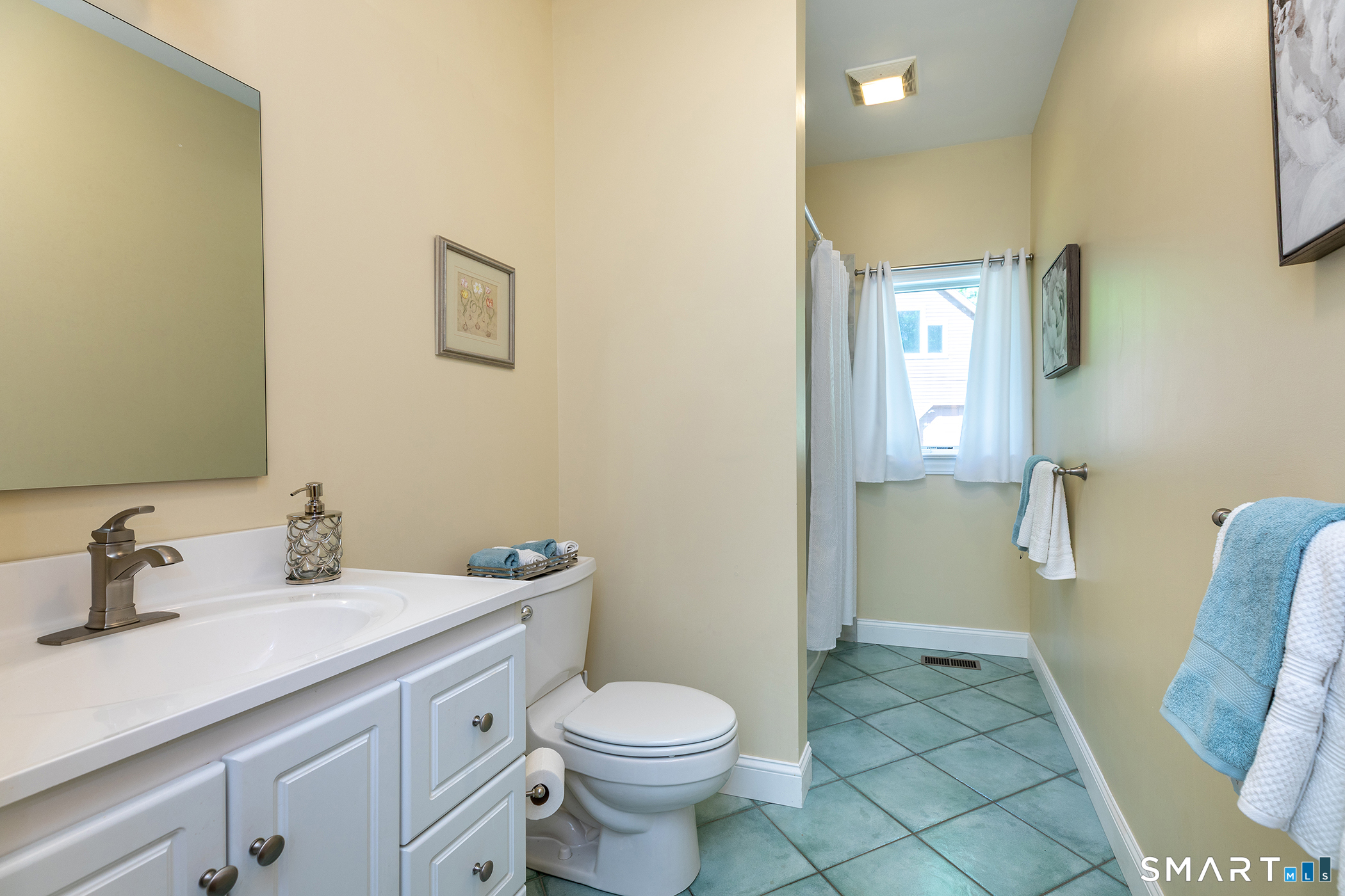 3 Old Forest Road Sherman, CT 06784 - Photo 11 of 38 a bathroom with a toilet sink and mirror