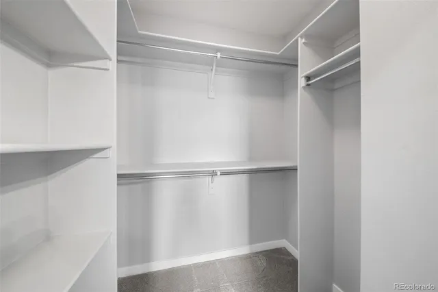 a view of an empty walk in closet