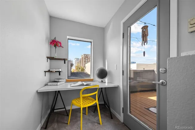 a room with furniture and a wooden floor