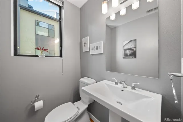 a workspace with furniture and view of kitchen