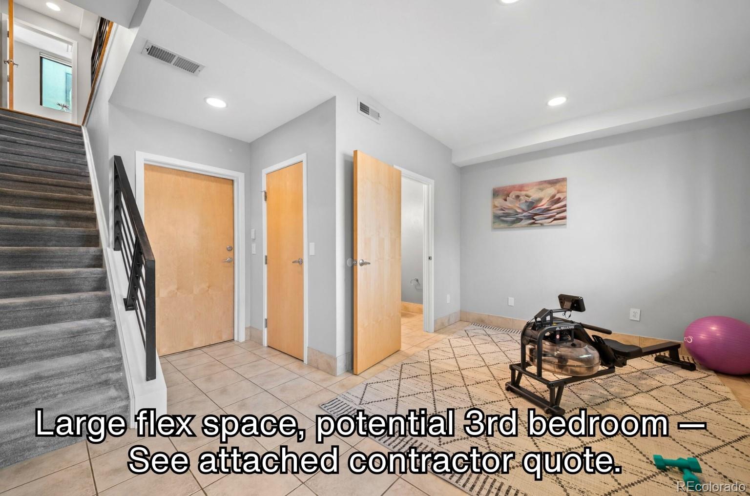 516 24th Street Denver, CO 80205 - Photo 24 of 42 a bedroom with a bed and a window