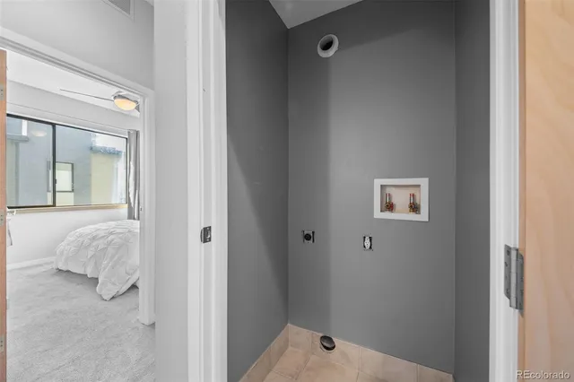 a picture of a bench in front of a wall