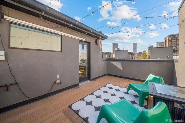 a view of a balcony with a swing