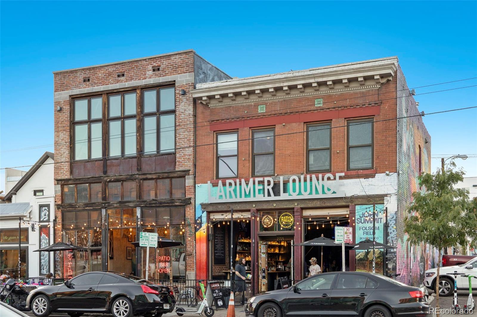 516 24th Street Denver, CO 80205 - Photo 40 of 42 a view of a building and car parked on the street