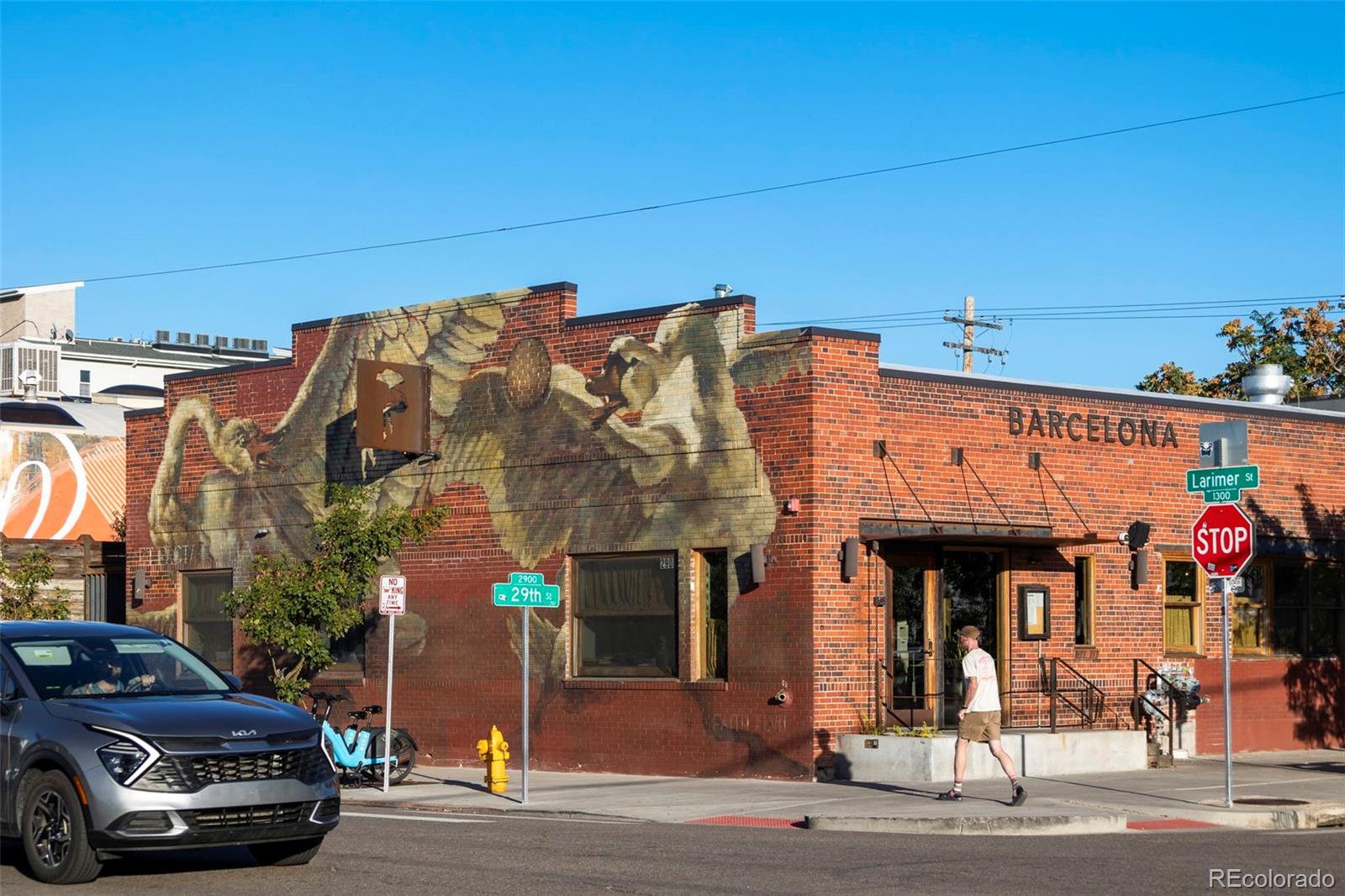 516 24th Street Denver, CO 80205 - Photo 42 of 42 a car parked in front of a building