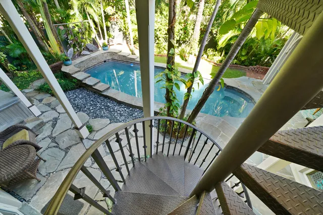 a view of balcony with furniture