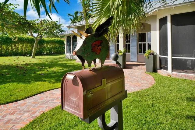 front view of a house with a big yard