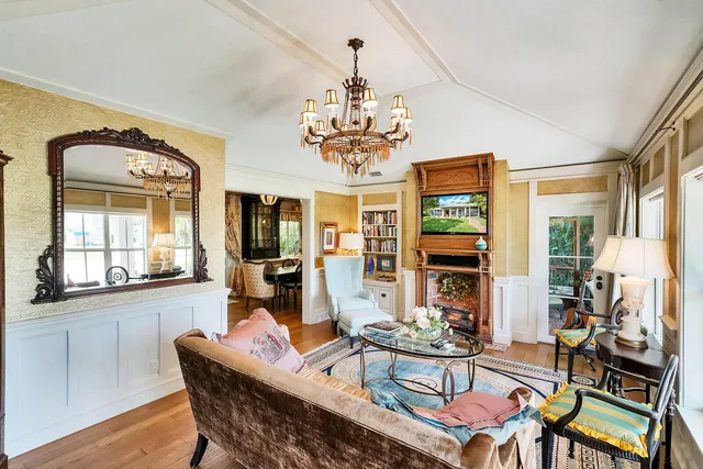 a view of living room with furniture and a window