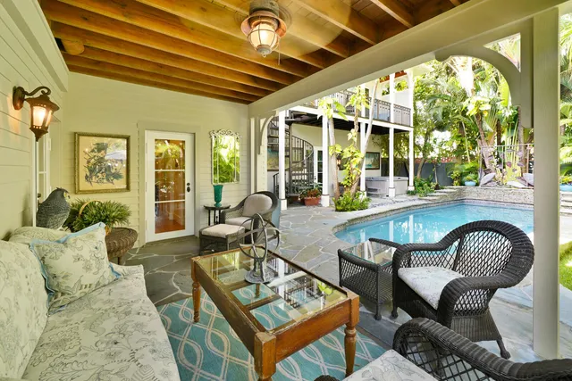 a view of a porch with seating space