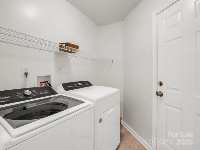 a view of balcony with wooden floor