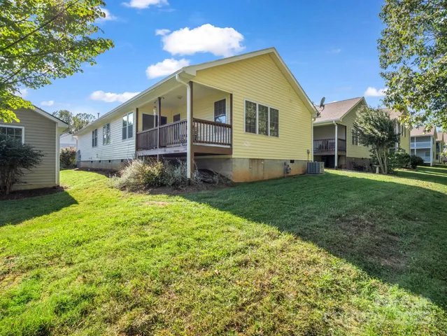 a view of a backyard of the house