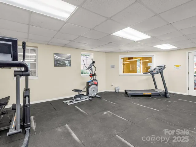 a view of a livingroom with furniture and window