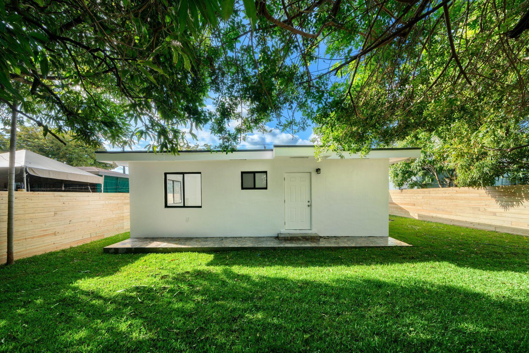 1367 Northwest 41st Street Miami, FL 33142 - Photo 18 of 20 a view of a backyard