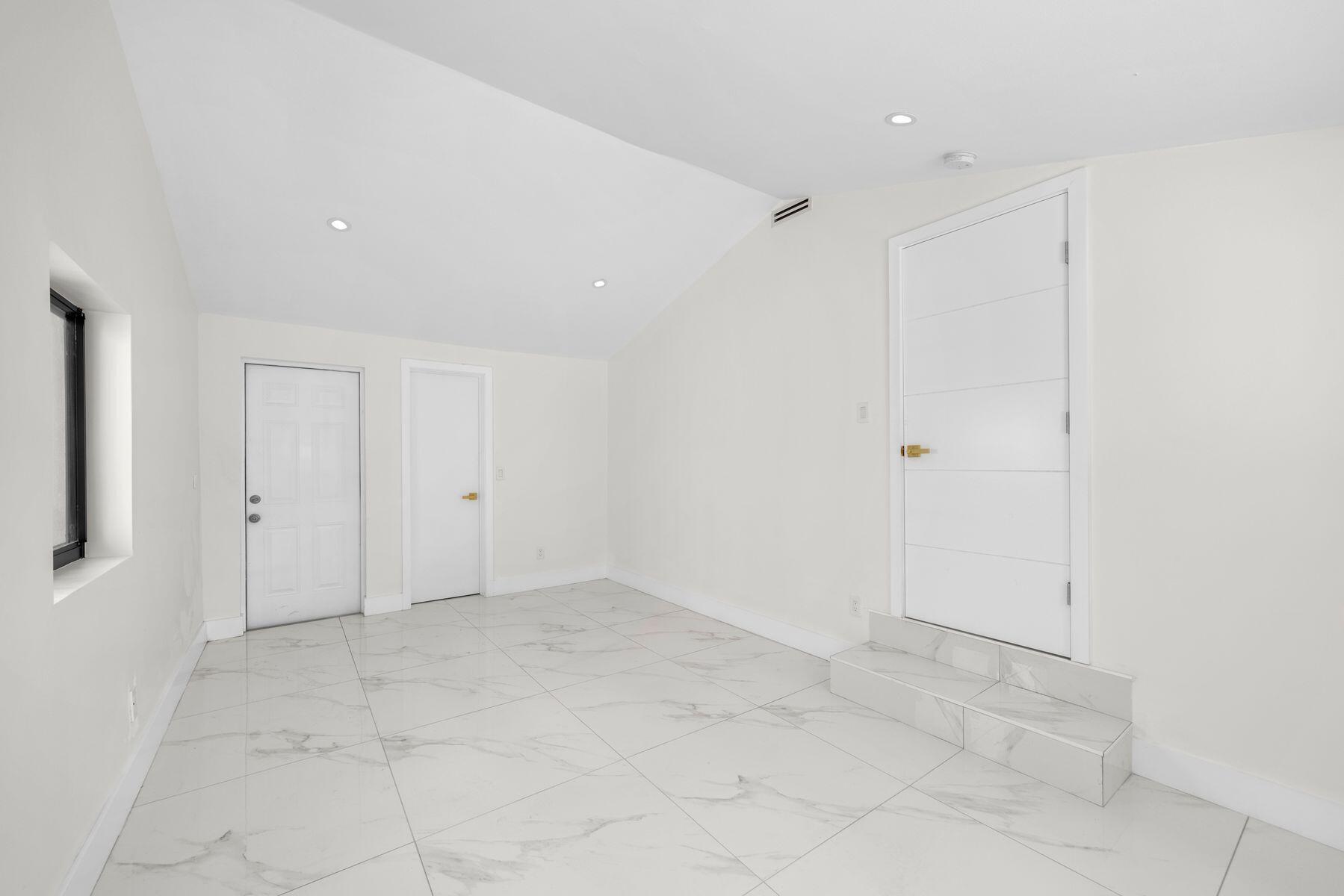 1367 Northwest 41st Street Miami, FL 33142 - Photo 8 of 20 a view of an empty room