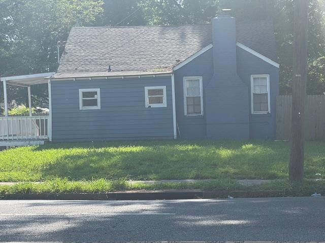 1688 Pendleton Street Memphis, TN 38114 - Photo 14 of 17 a brick house with a yard