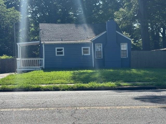 1688 Pendleton Street Memphis, TN 38114 - Photo 3 of 17 a brick house with a yard