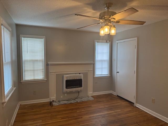 1688 Pendleton Street Memphis, TN 38114 - Photo 9 of 17 a view of an empty room with wooden floor and a window