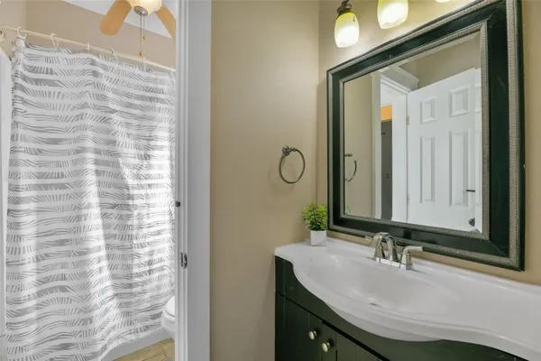 a bathroom with a sink and a toilet
