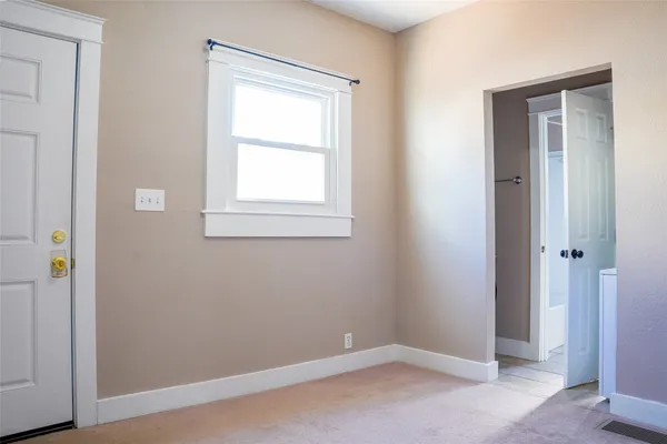 a bathroom with a toilet and a sink