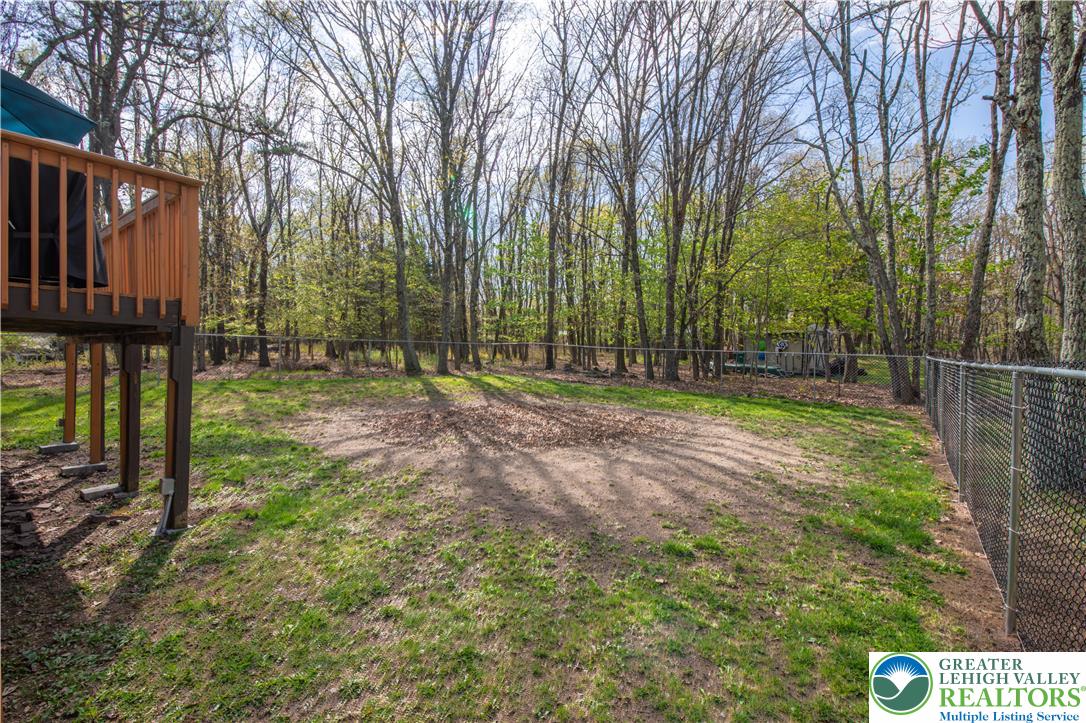 107 Shenkel Road Effort, PA 18330 - Photo 38 of 44 a view of outdoor space with deck and trees