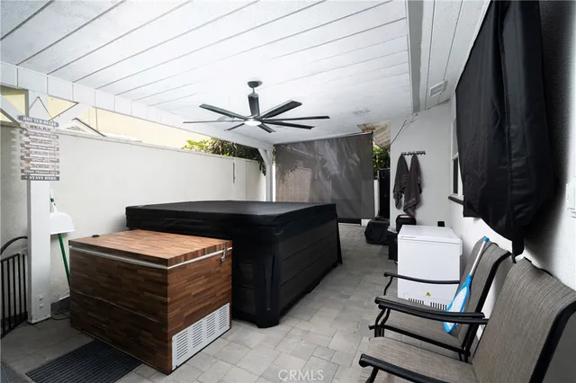 a room with a bed and furniture