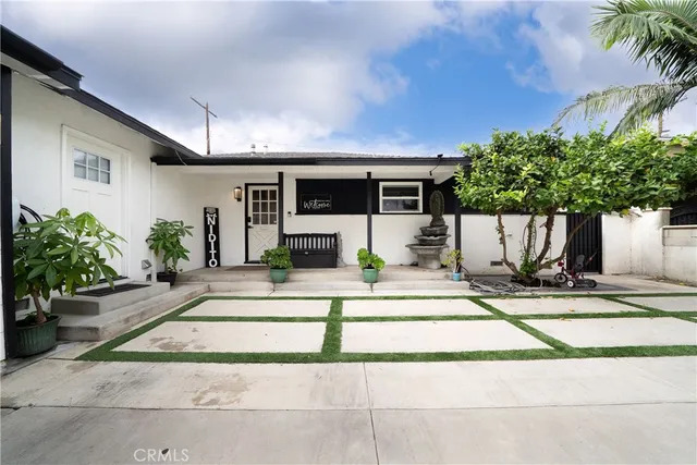 a view of a potted plants on the side of a road