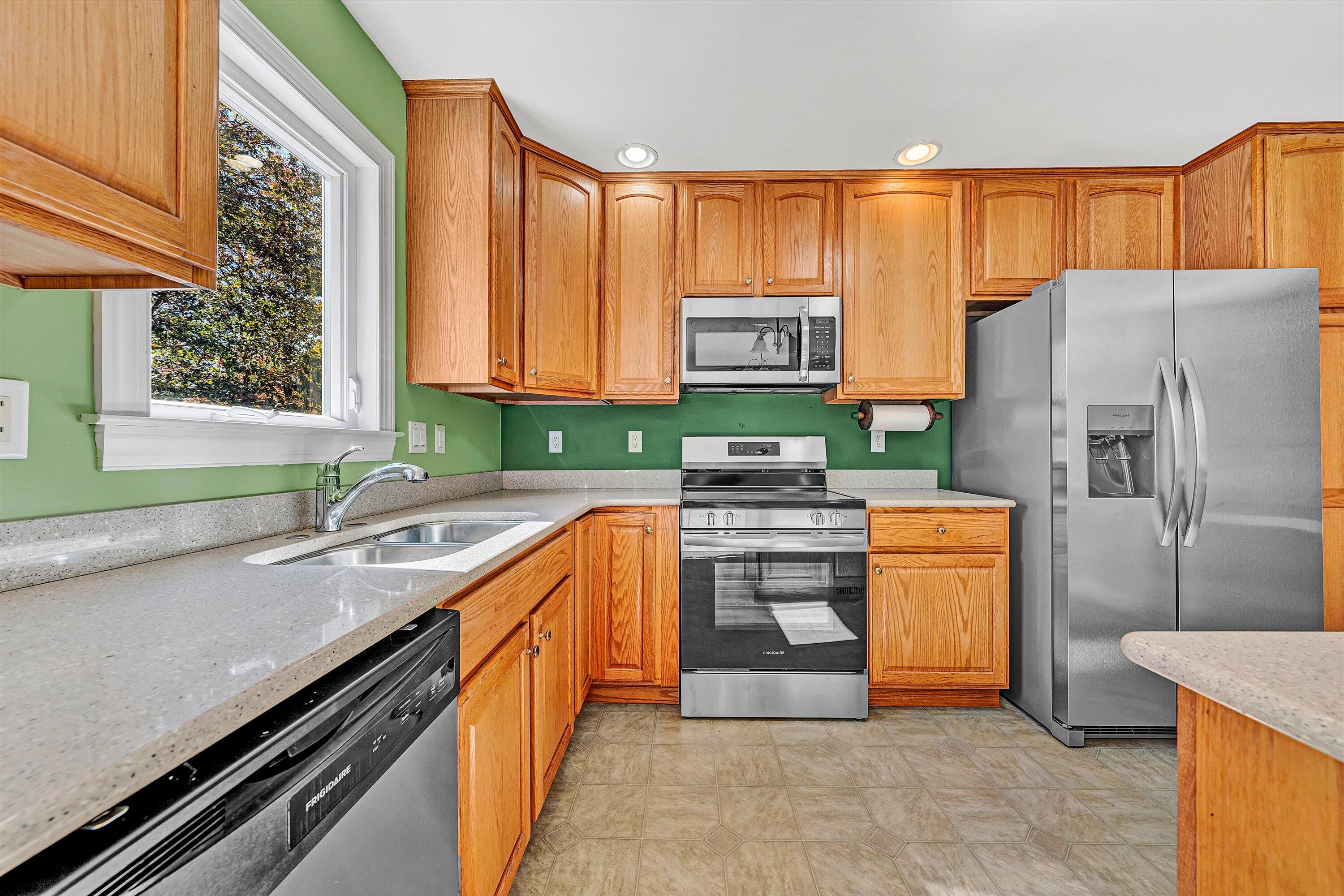 401 Piney Ridge Road Covington, VA 24426 - Photo 12 of 83 a kitchen with stainless steel appliances a refrigerator sink and stove