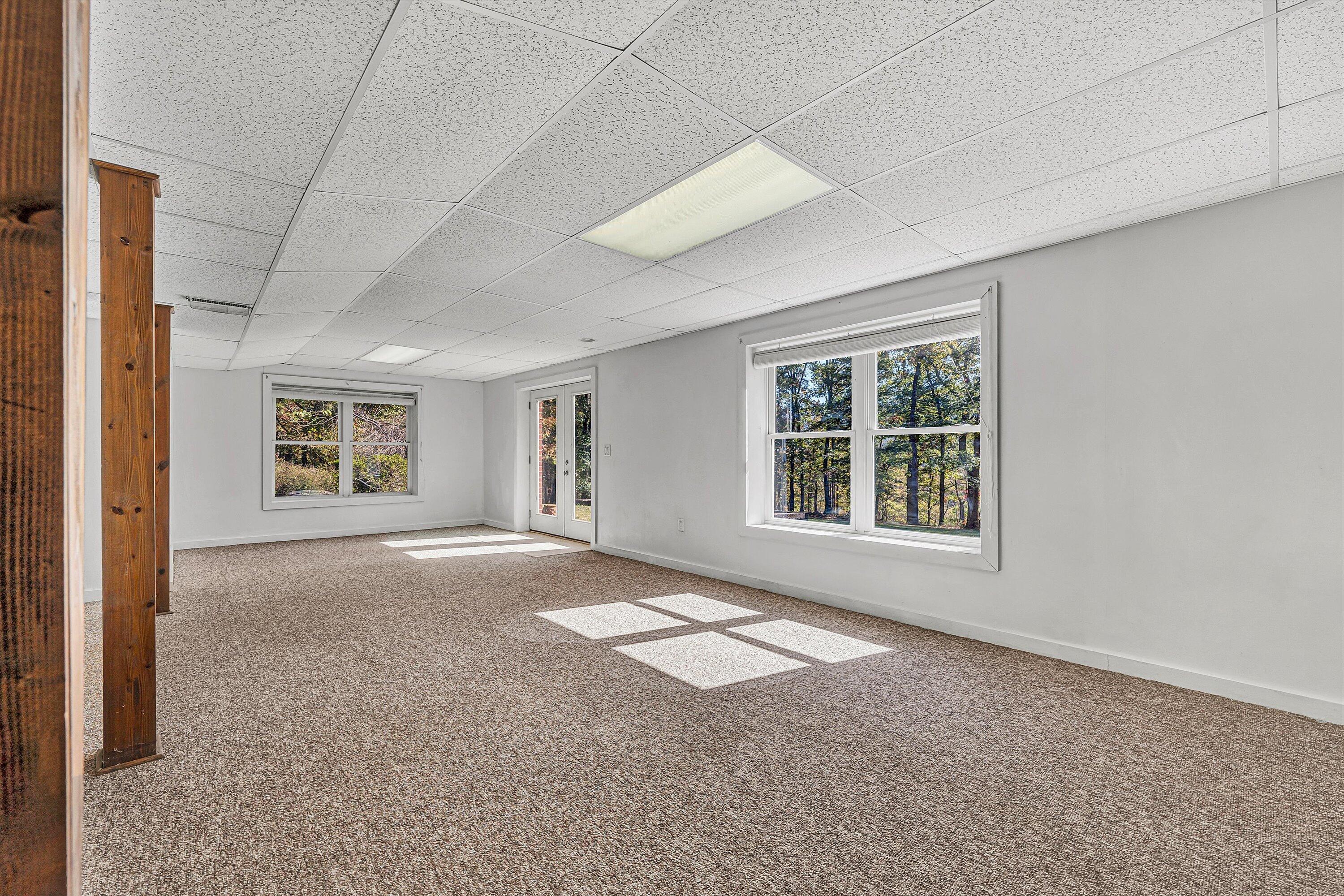 401 Piney Ridge Road Covington, VA 24426 - Photo 39 of 83 an empty room with windows