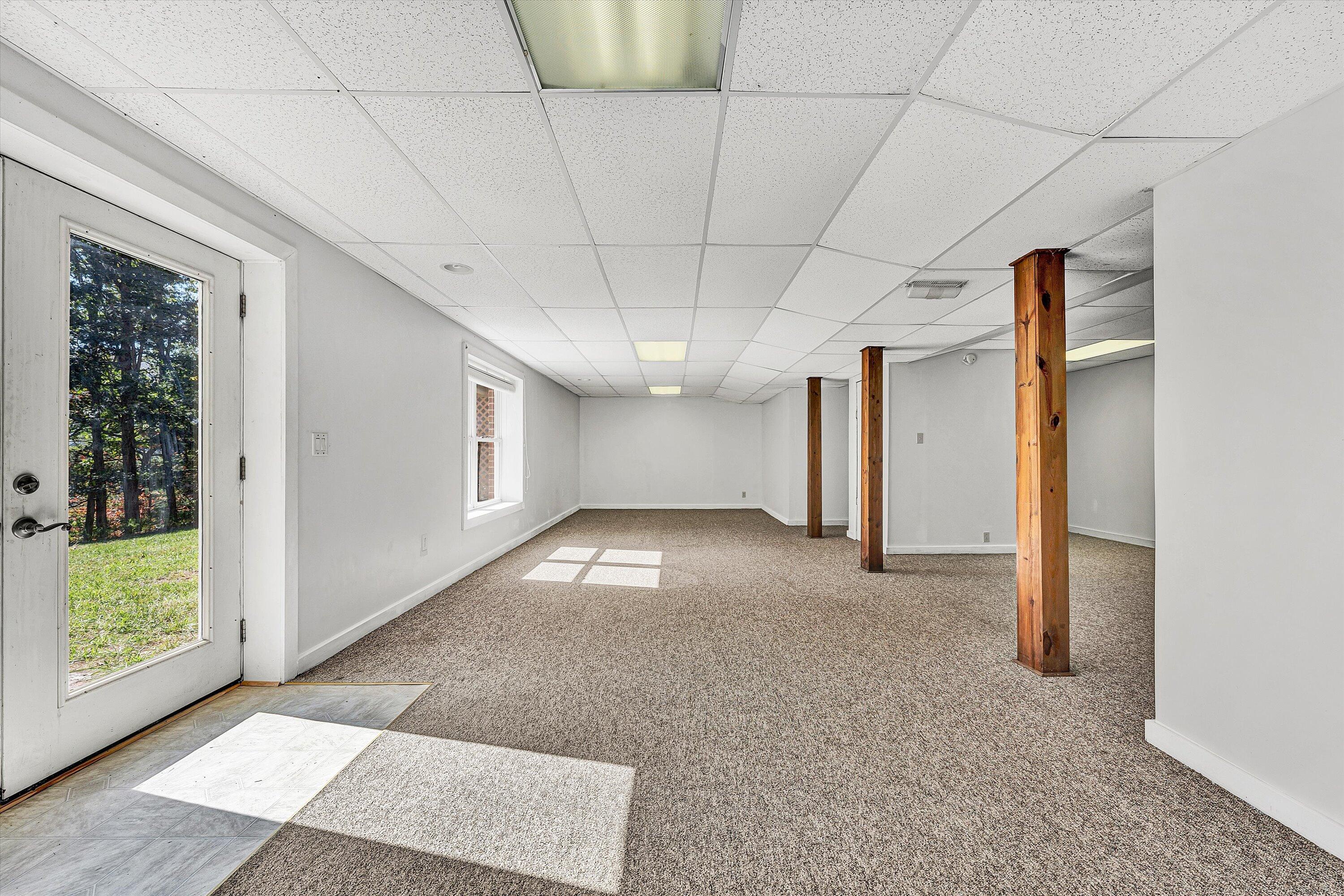 401 Piney Ridge Road Covington, VA 24426 - Photo 44 of 83 a view of a livingroom with an empty space and a window