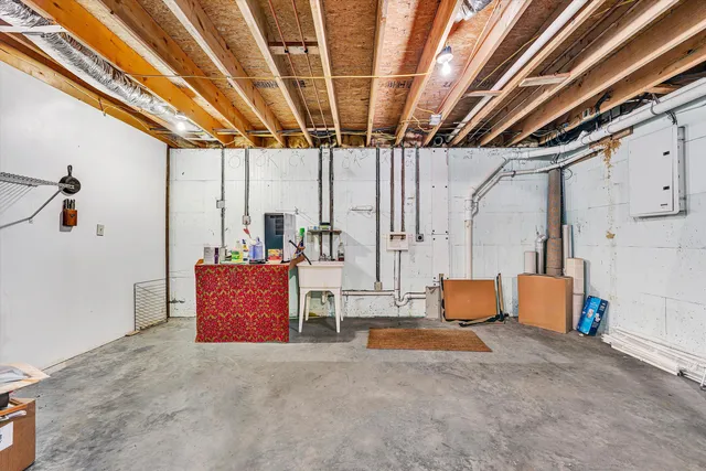 a view of a mountain range in a lush green field